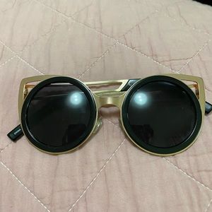 Rose gold and black cat eye rounded sunglasses